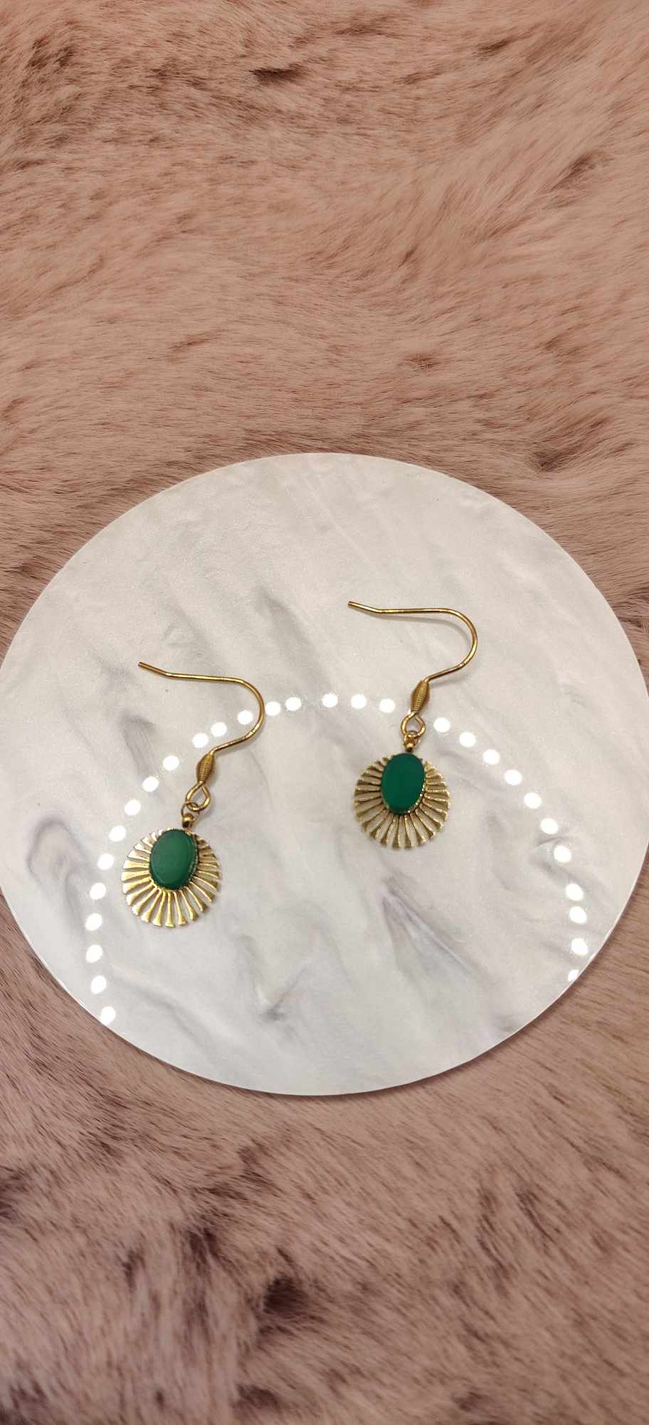 Boucles d'oreilles dorées et petit soleil